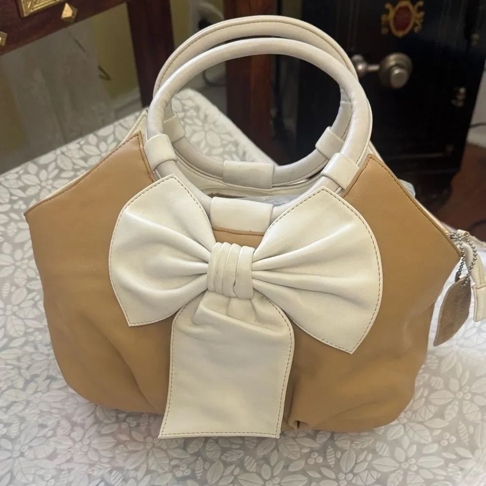 GUESS Cream and Tan Bow Accent Handbag